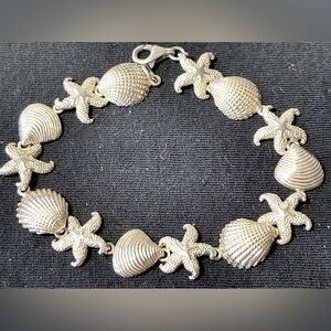 Starfish and seashells sterling silver detailed bracelet
